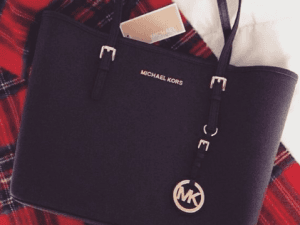 Shopping spree at $KORS pays off